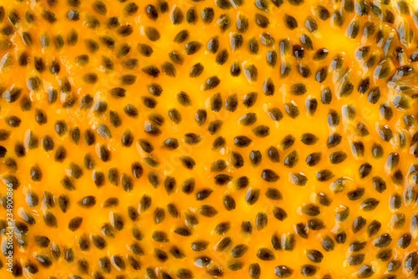 Fototapeta Passion fruit juice close up texture for background