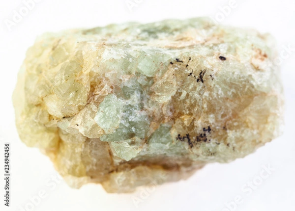Obraz rough green beryl (chrysoberyl) stone on white