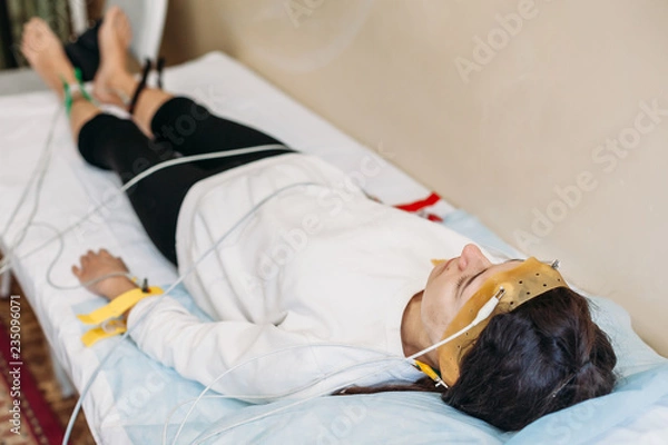 Fototapeta patient with encephalography electrode. medical examination Electroencephalogram studying the vascular system of the brain (EEG)
