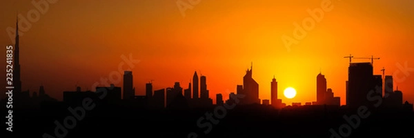 Fototapeta Dubai skyscrapers during sunset