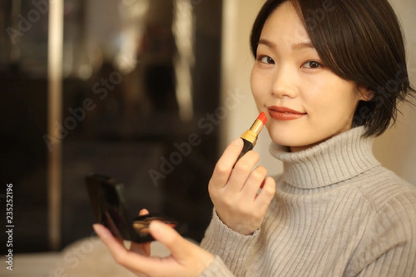 Fototapeta 化粧する女性