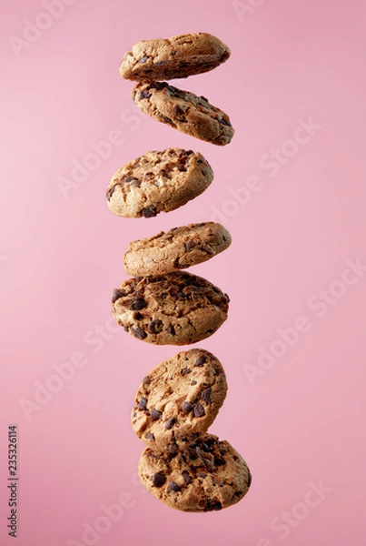 Obraz Chocolate chip cookies falling in stack