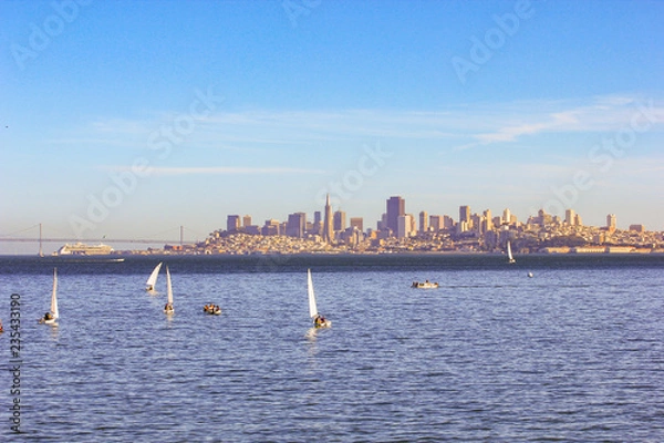 Obraz Skyscrapers and city of San Francisco with a view from the water - sea side at sunset.