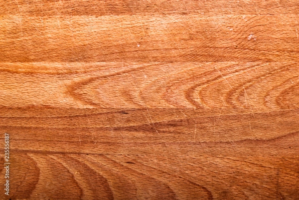 Obraz Used scraped kitchen board. Wood layers forming the surface of a kitchen board.