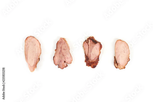 Obraz Slices of grilled chicken meat, isolated on white background.