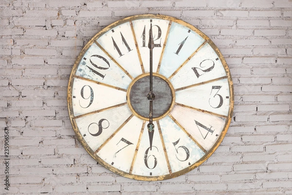 Obraz Retro clock showing six oclock on the wall