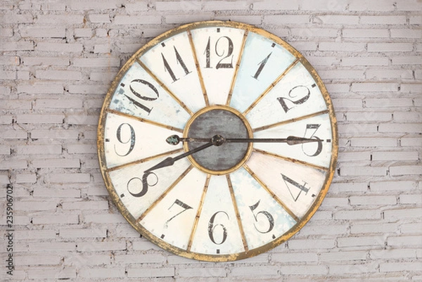 Obraz Retro clock showing eight fifteen on the wall