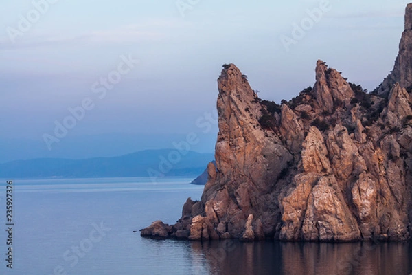 Fototapeta Dawn near the village Novyi Svit - New light. City district Sudak, the Republic of Crimea.