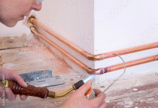 Obraz plumber and soldering gun