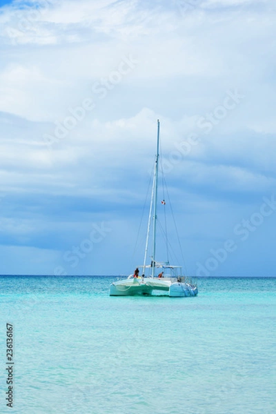 Fototapeta PUNTA CANA, DOMINICAN REPUBLIC - October 2018: catamarans at Bavaro Beach in Punta Cana