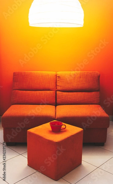 Obraz Orange sofa and cup matte