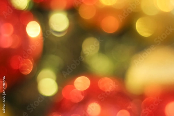 Fototapeta Defocused abstract christmas background. Red and yellow circle background