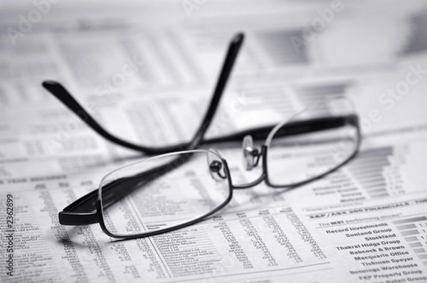 Obraz glasses on a newspaper
