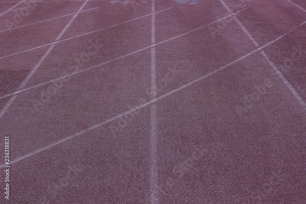 Fototapeta poor soft color running track on sport  stadium place background texture surface with marking and empty copy space