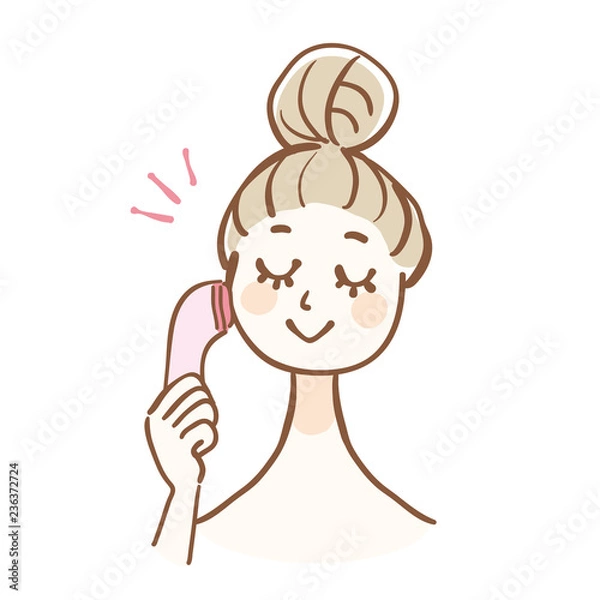 Obraz 美顔器を使う女性