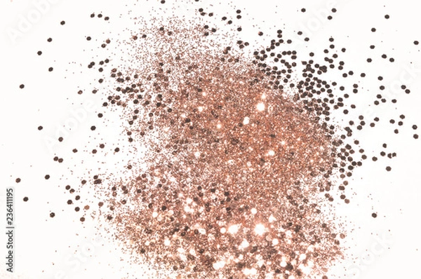 Fototapeta Rose gold glitter on white background in vintage nostalgic colors