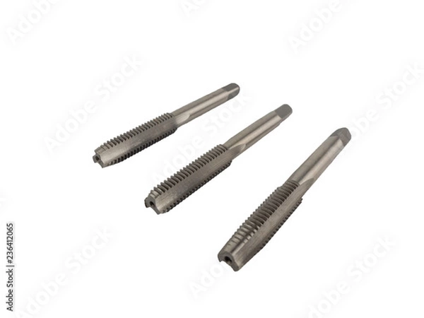 Fototapeta Cutting tools, Threading hand screw tap with different sizes isolated on white background.
