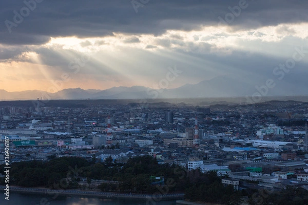 Obraz 光が差し込む都市