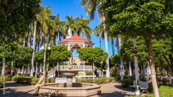 Fototapeta A gazebo and fountain in El Fuerte park, in the city of El Fuerte in Sinaloa state, Mexico