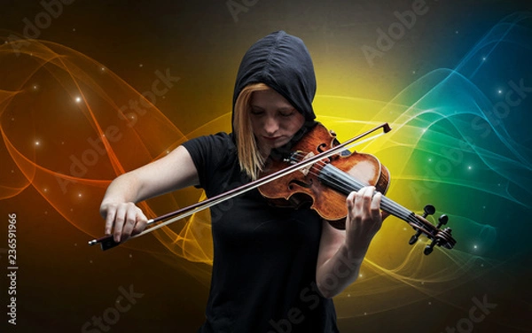 Fototapeta Serious classical violinist with fabled sparkling wallpaper