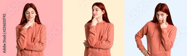 Fototapeta Set of Young redhead girl with pink sweatshirt standing and looking to the side, front and down on colorful background