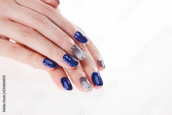 Fototapeta a woman's nail, designed with nail art