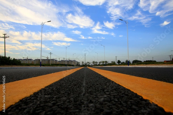 Fototapeta new roads under blue sky and white clouds