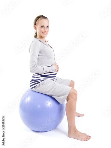 Obraz Młoda kobieta w ciąży ćwiczenia z piłką fitness