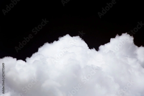 Obraz White clouds in the sky at night.