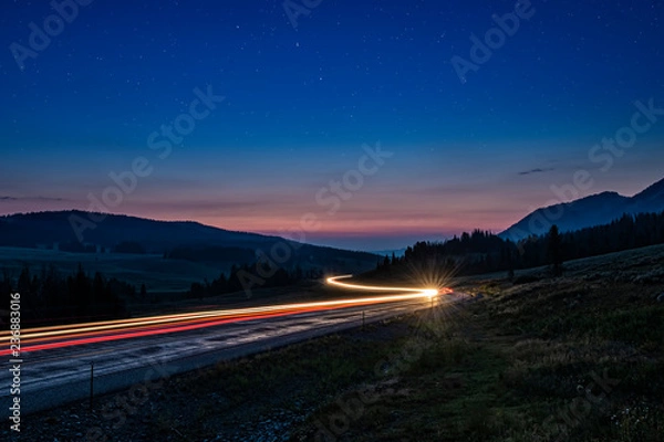 Fototapeta Highway light trails sunset
