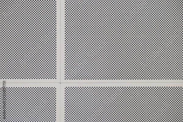 Fototapeta Bottom view of metal grille plate ceiling with many small holes