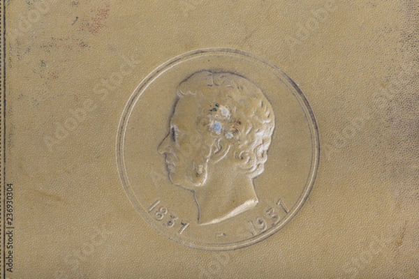 Fototapeta Vintage background from cover of old books with portrait of Alexandr Pushkin