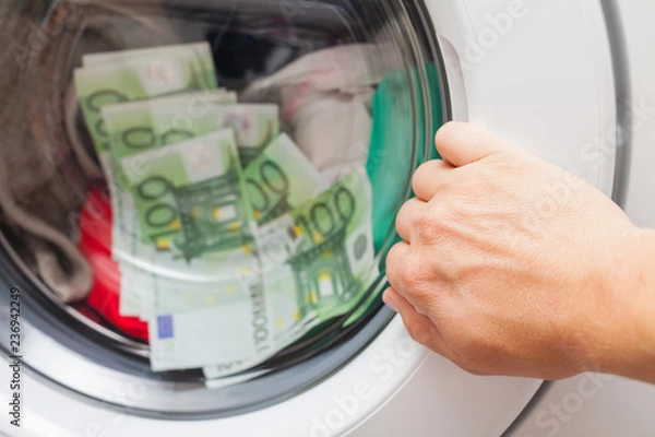 Fototapeta Money stuck in the washing machine