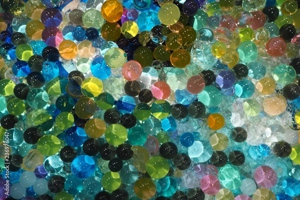 Fototapeta Multicolored hydrogel balls texture background.