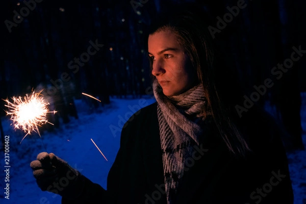 Obraz Woman with sparkler