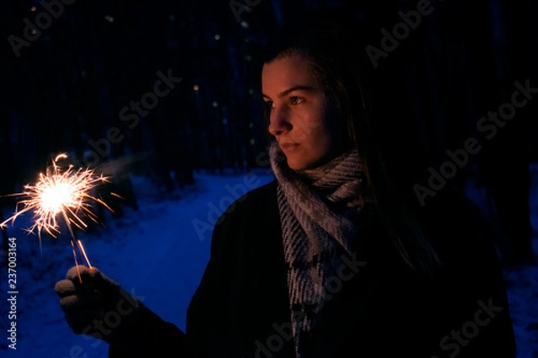 Obraz Woman with sparkler