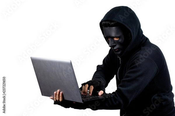 Fototapeta Hacker using laptop