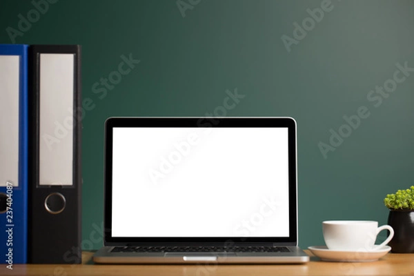 Fototapeta Mock Up Of Blank Laptop On The Desk