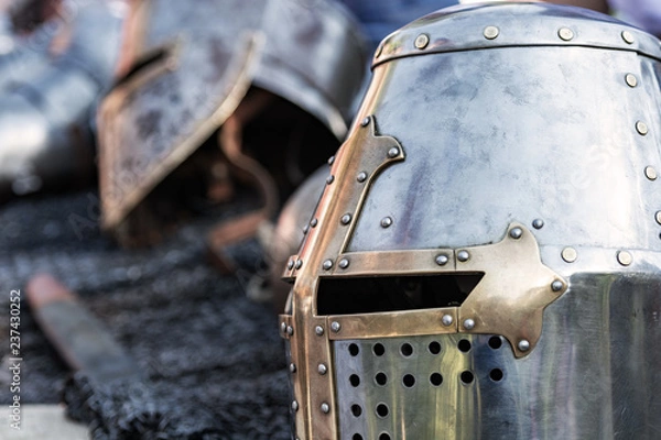 Obraz old knight armor is lying on the table