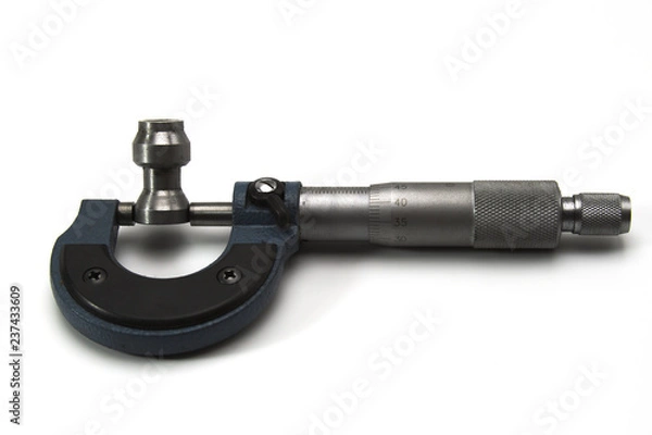 Fototapeta 12 gauge diameter micrometer measurement for a hunting rifle close-up on a white background