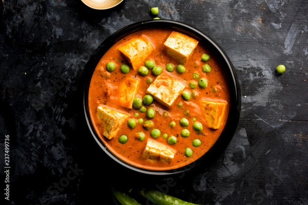 Fototapeta Green peas or matar paneer curry recipe, served in a bowl. selective focus
