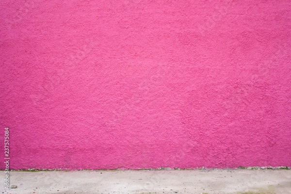 Fototapeta Pink concrete wall background texture for composing, top view, copy space
