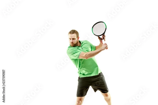 Fototapeta The one caucasian man playing tennis isolated on white background. Studio shot of fit young player at studio in motion or movement during sport game..
