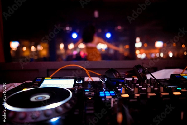 Obraz DJ sound equipment at nightclubs and music festivals, EDM, future house music and so on. Parties concept, sound technique. DJ playing on the best, famous CD players.