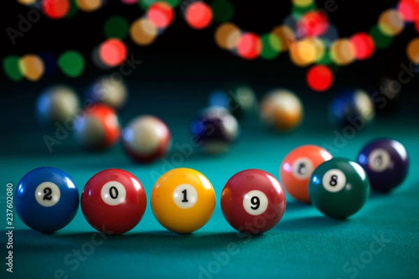 Obraz Billiard balls with numbers on the billiard table