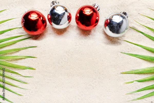 Fototapeta Christmas spheres on the beach