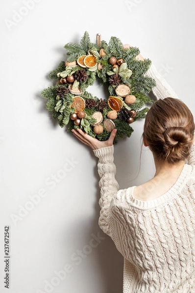 Fototapeta Rustic Christmas wreath on a gray background