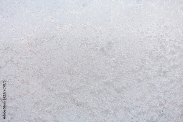Fototapeta Background ice on the glass. Frost. The texture of frost. The glass is frozen.