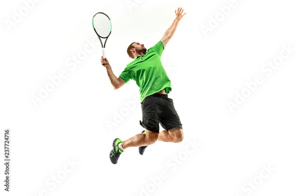 Fototapeta The one caucasian man playing tennis isolated on white background. Studio shot of fit young player at studio in motion or movement during sport game..