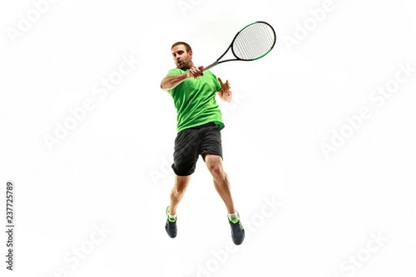 Fototapeta The one caucasian man playing tennis isolated on white background. Studio shot of fit young player at studio in motion or movement during sport game..